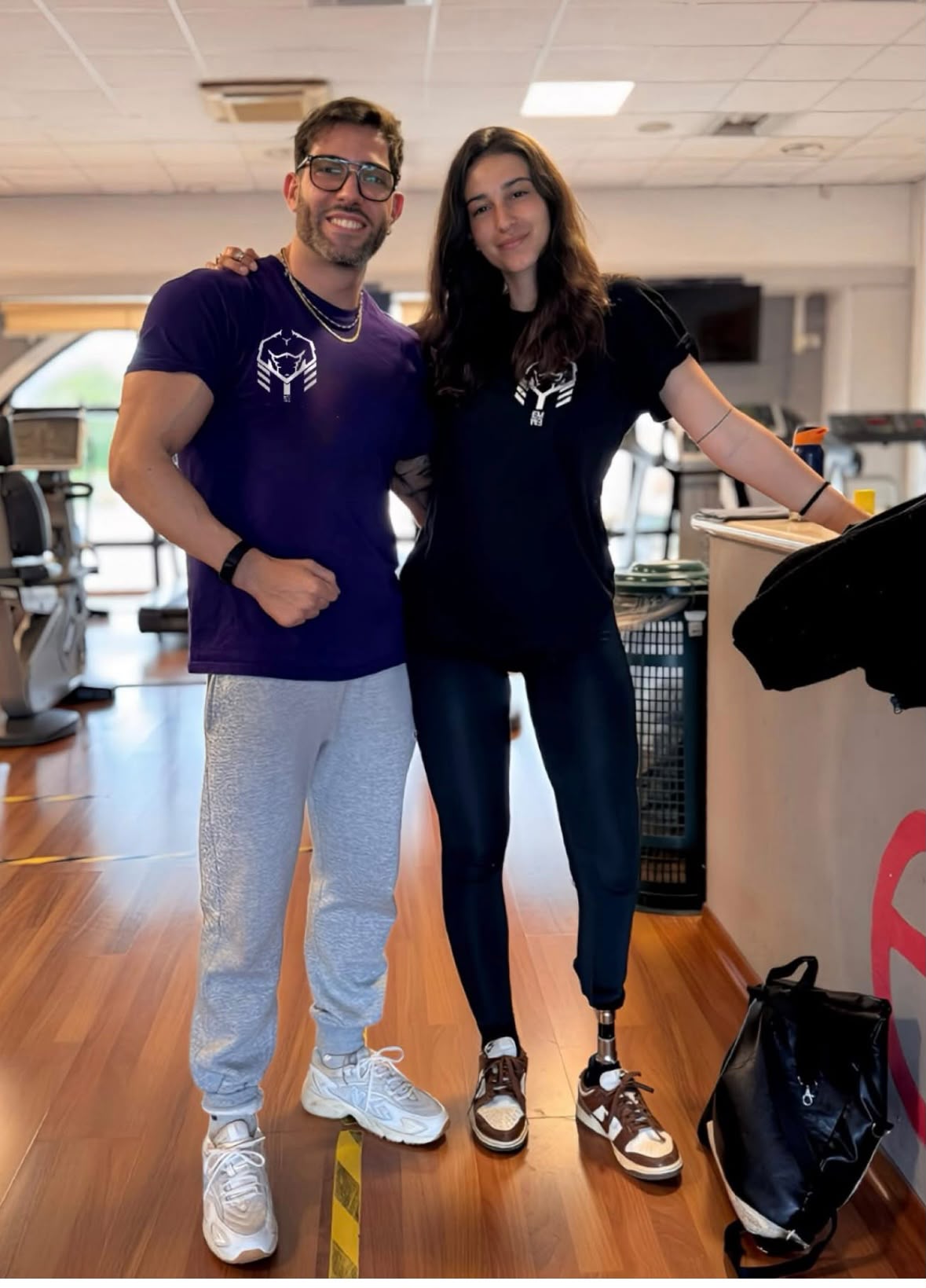 Mario con un'atleta Team Emme in palestra
